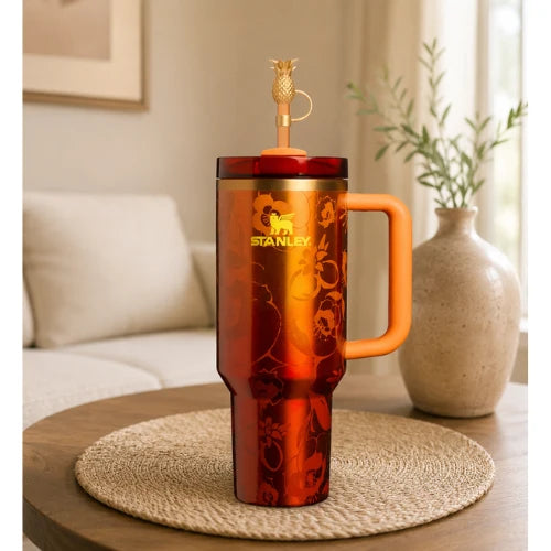 The Stanley 1913 x KAROL G 40 oz Quencher H2.O FlowState Tumbler